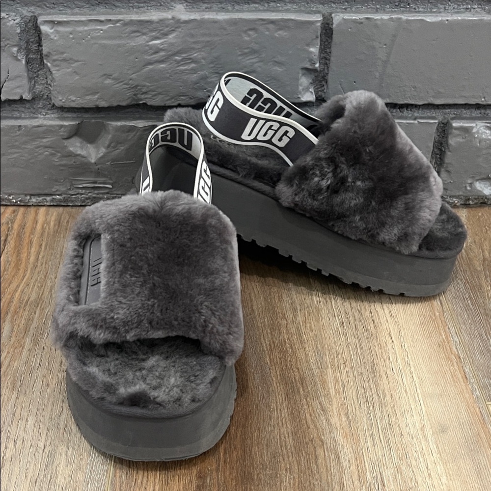UGG women’s Charcoal Fluffy Platform Slippers
